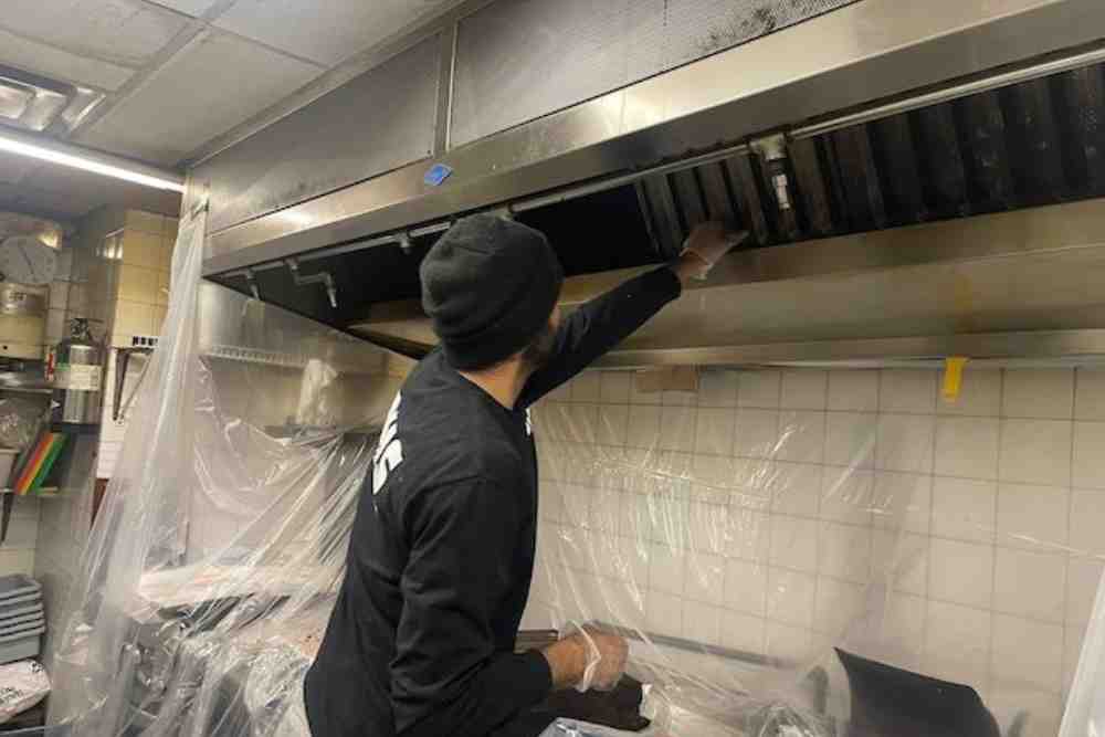 Grease Fire Defense with Regular Cleaning of Kitchen Hood